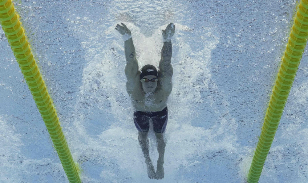 Huske, Dressel, Walsh win more US golds at swimming worlds
