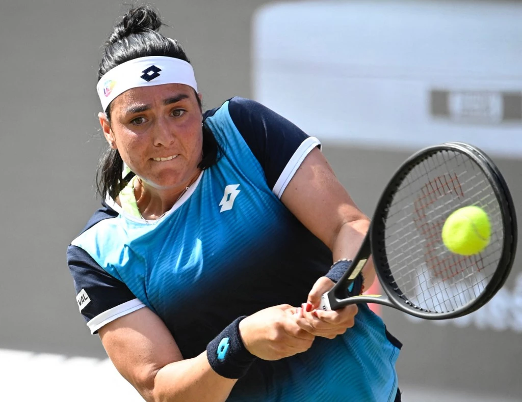 Ons Jabeur teams up with Serena Williams as the American legend Williams makes her first competitive appearance in nearly 12 months at Wimbledon. (AFP)