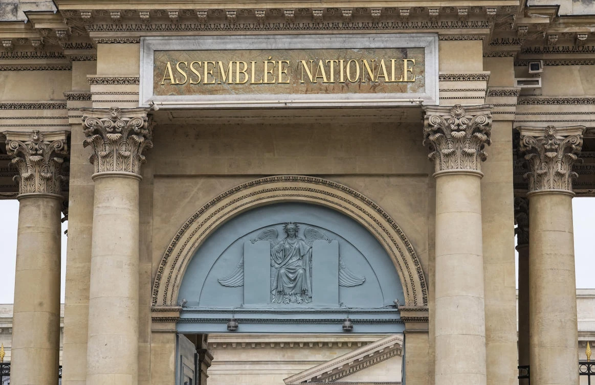 The logo of the National Assembly is photographed at the entrance gate in Paris, Monday, June 20, 2022. (AP)