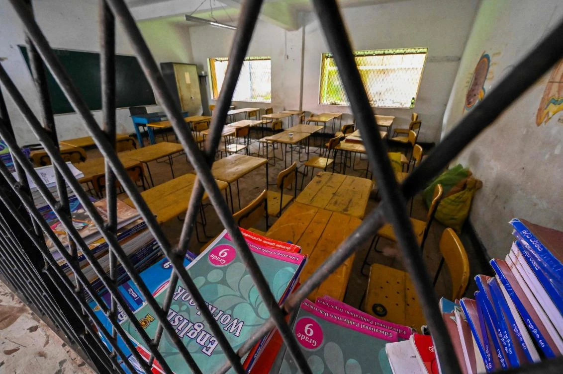 Sri Lanka closed schools and halted non-essential government services during two-week shutdown to conserve fast-depleting fuel reserves. (AFP)