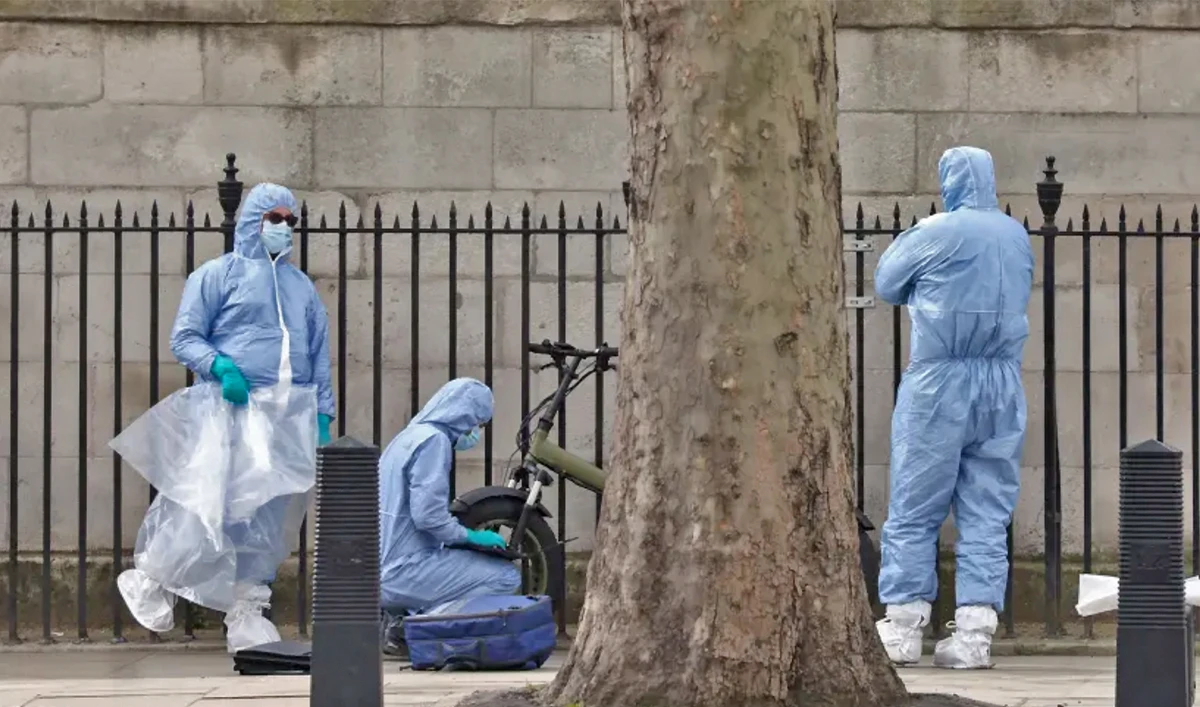 Police forensic officials work at a cordoned-off area on Whitehall in Westminster in London, Britain, on April 18, 2022. (REUTERS/File)