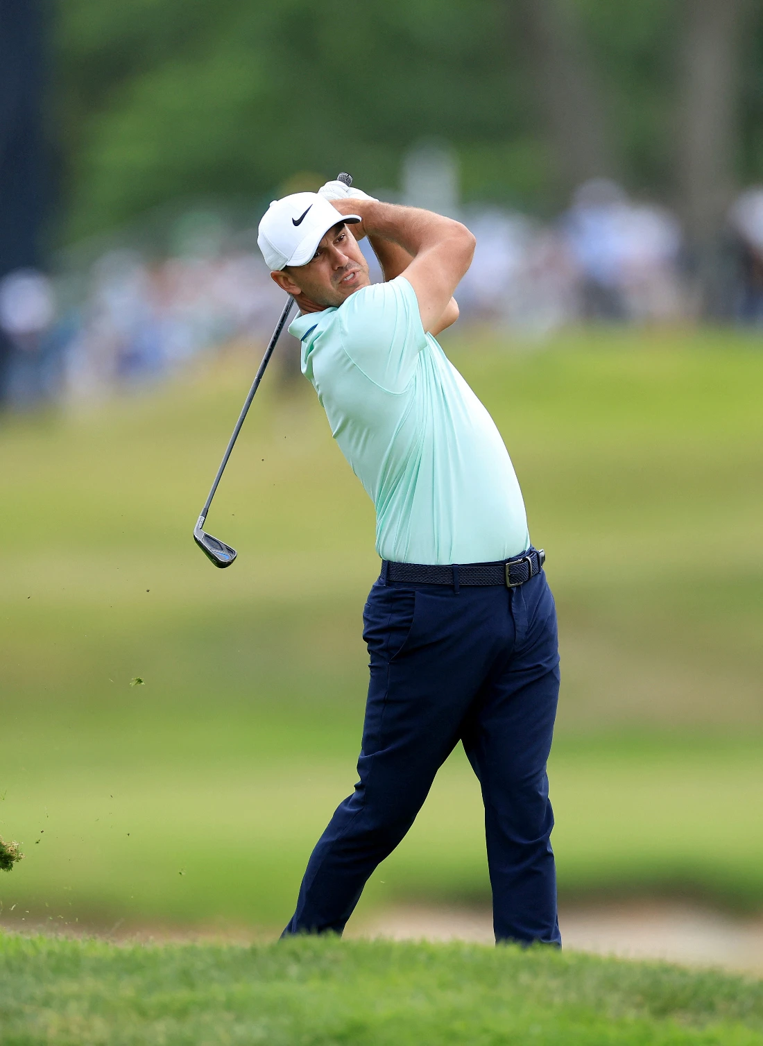 Brooks Koepka plays second shot on the eighth hole during the third round of 2022 US Open at The Country Club. (AFP)