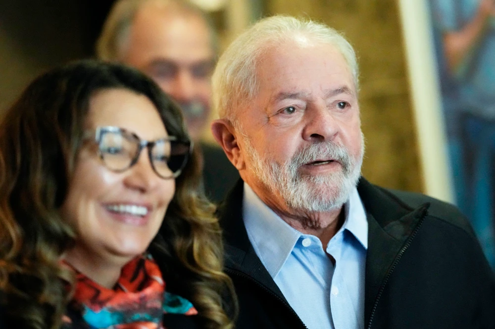 Brazil’s former president Luiz Inacio Lula da Silva, who is running for reelection, and his wife Rosangela Silva. (AP)