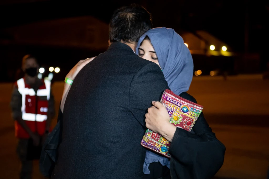 Afghan collaborators with the Spanish mission in Afghanistan and their families. (File/AFP)