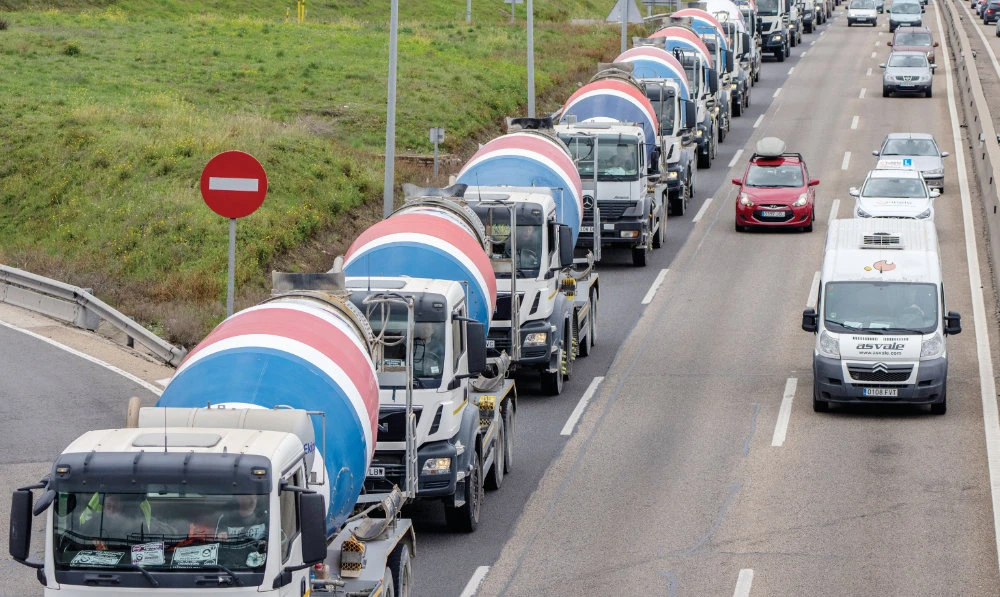 Trucks gather to protest against the high price of fuel in Parla, on outskirts of Madrid. As food costs and fuel bills soar, inflation is plundering people’s wallets. (AP)
