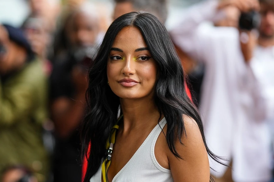 The designer showed off a yellow-hued makeup look at the show. (Getty Images)