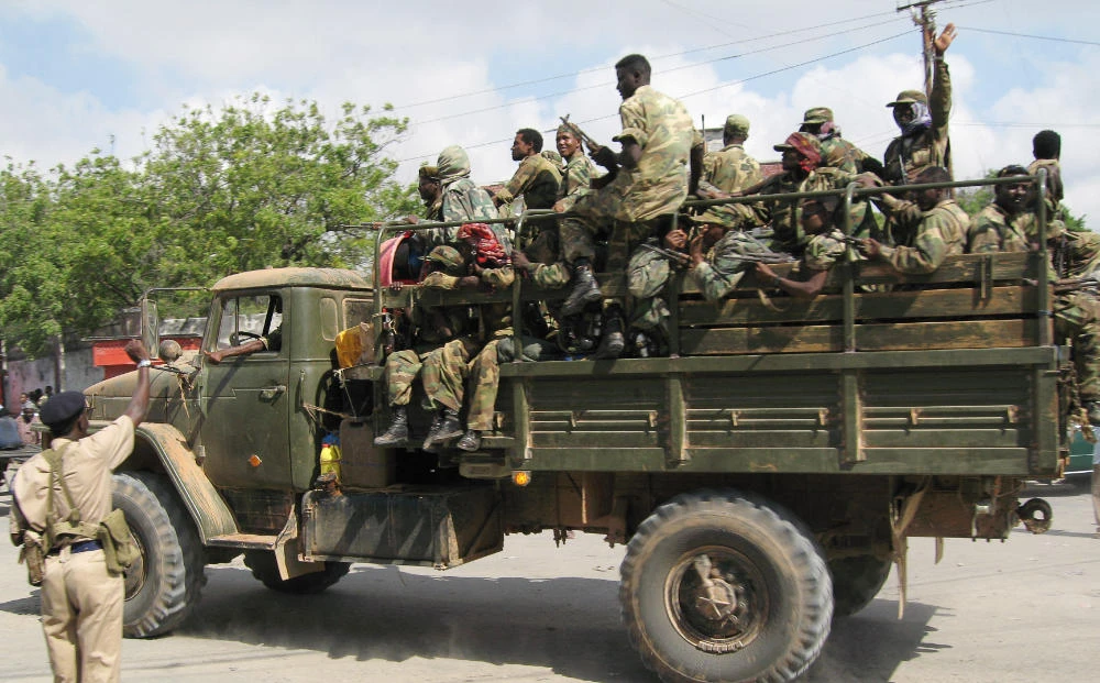An Ethiopian Army truck, belonging to the first batch of Ethiopian troops leaving the Somali capital Mogadishu, drives away 23 January 2007 after a departure ceremony. (AFP)