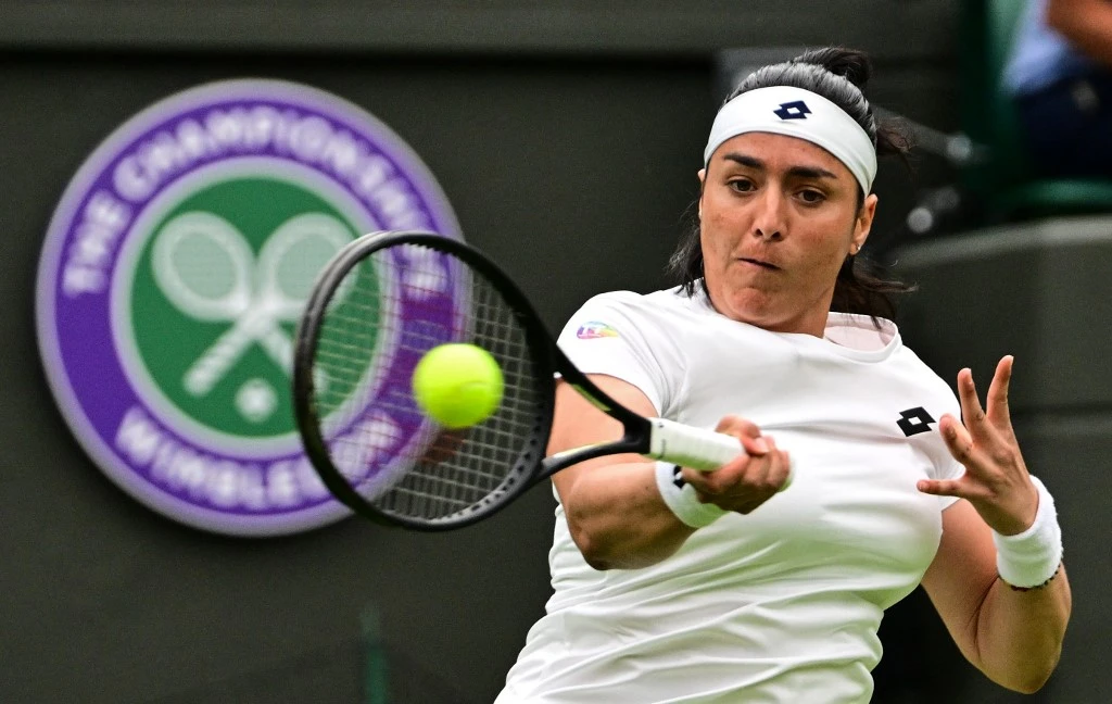 Tunisian tennis superstar Ons Jabeur ‘is under a lot of pressure, but she is playing wonderfully, and her style suits grass,’ according to a sport analyst. (AFP)