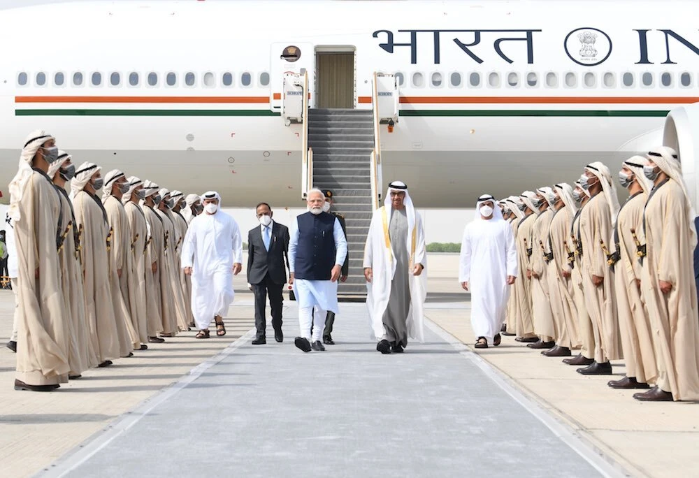 PM Modi being greeted at the airport by UAE president Sheikh Mohammed bin Zayed Al Nahyan in Abu Dhabi on Tuesday. (Source: Twitter of PM Modi)