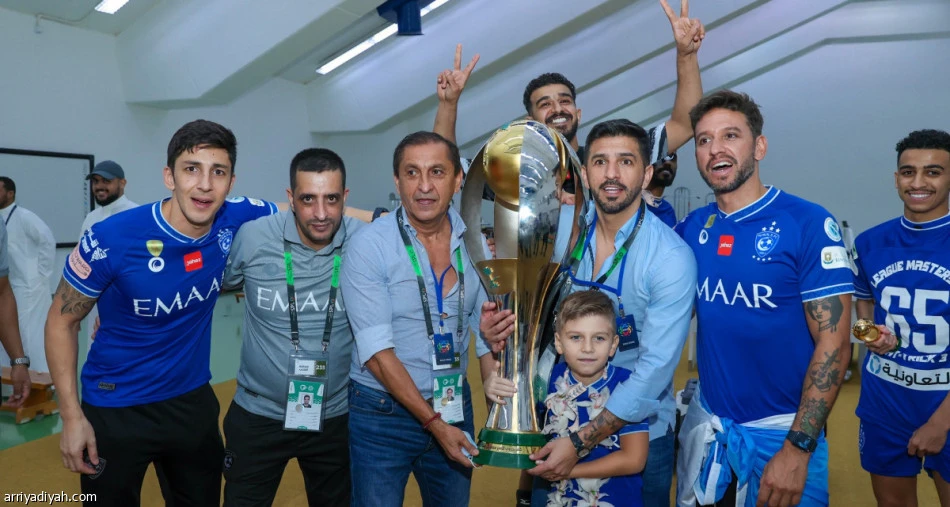 Al-Hilal's Argentine coach Ramon Diaz (third from left) celebrates winning the Saudi Pro League title. (Arriyadiyah)