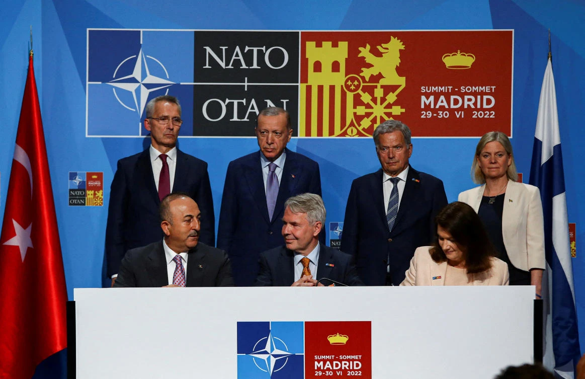 Turkish President Tayyip Erdogan with Finland's President Sauli Niinisto, Sweden's PM Magdalena Andersson and NATO’s Jens Stoltenberg at Madrid's NATO Summit. (REUTERS)