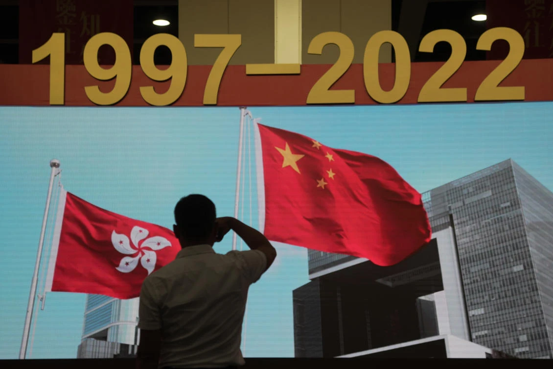 A man tours an exhibition to mark the 25th anniversary of the former British colony’s return to Chinese rule, in Hong Kong, on Friday. (AP)