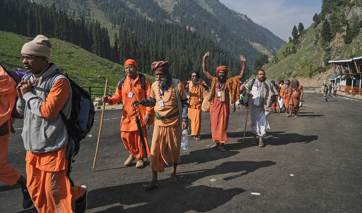 Hindu devotees begin the Amarnath Yatra annual pilgrimage to to an icy Himalayan cave, in Chandanwari, Pahalgam, south of Srinagar, Indian-controlled Kashmir, on June 30, 2022. (AP)