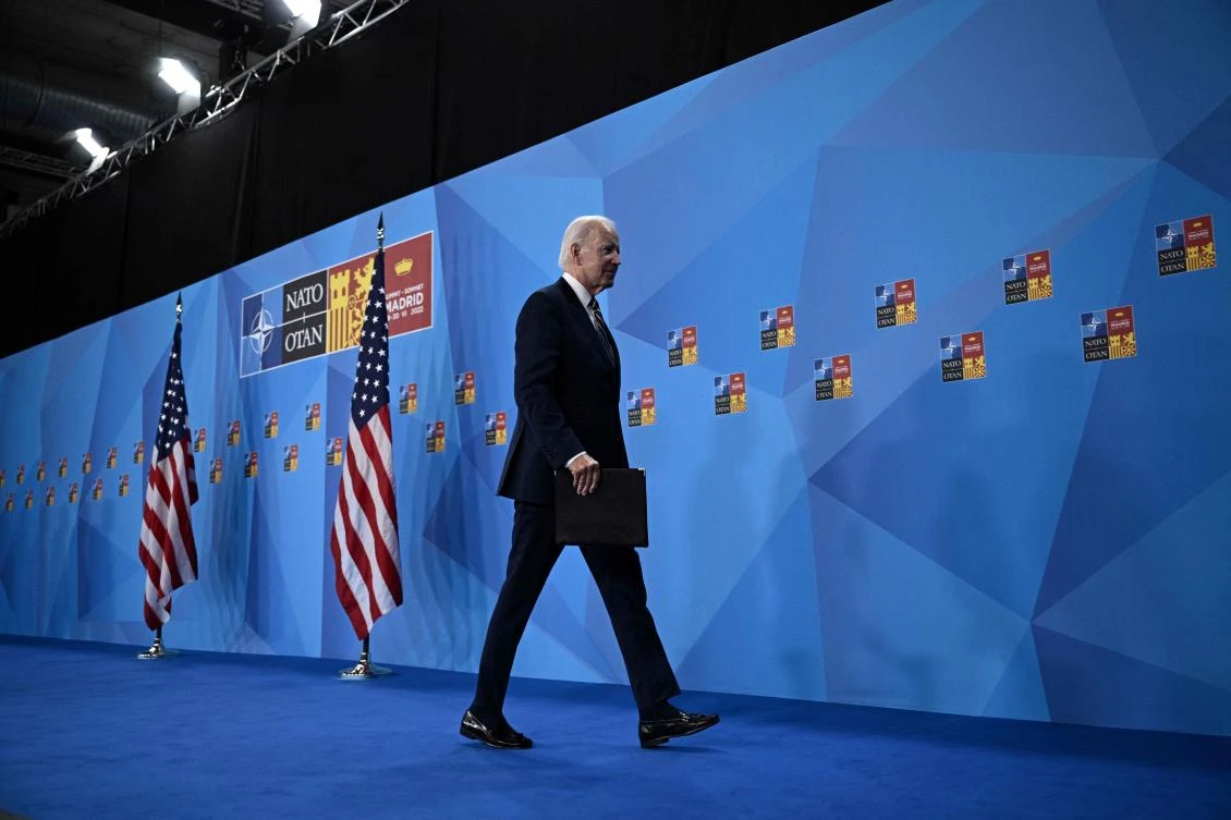 US President Joe Biden walks off stage after addressing media representatives during a press conference at the NATO summit, IFEMA Convention Center, Madrid, June 30, 2022. (AFP)