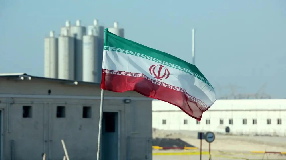 A file photo shows an Iranian flag in Iran’s Bushehr nuclear power plant. (AFP)