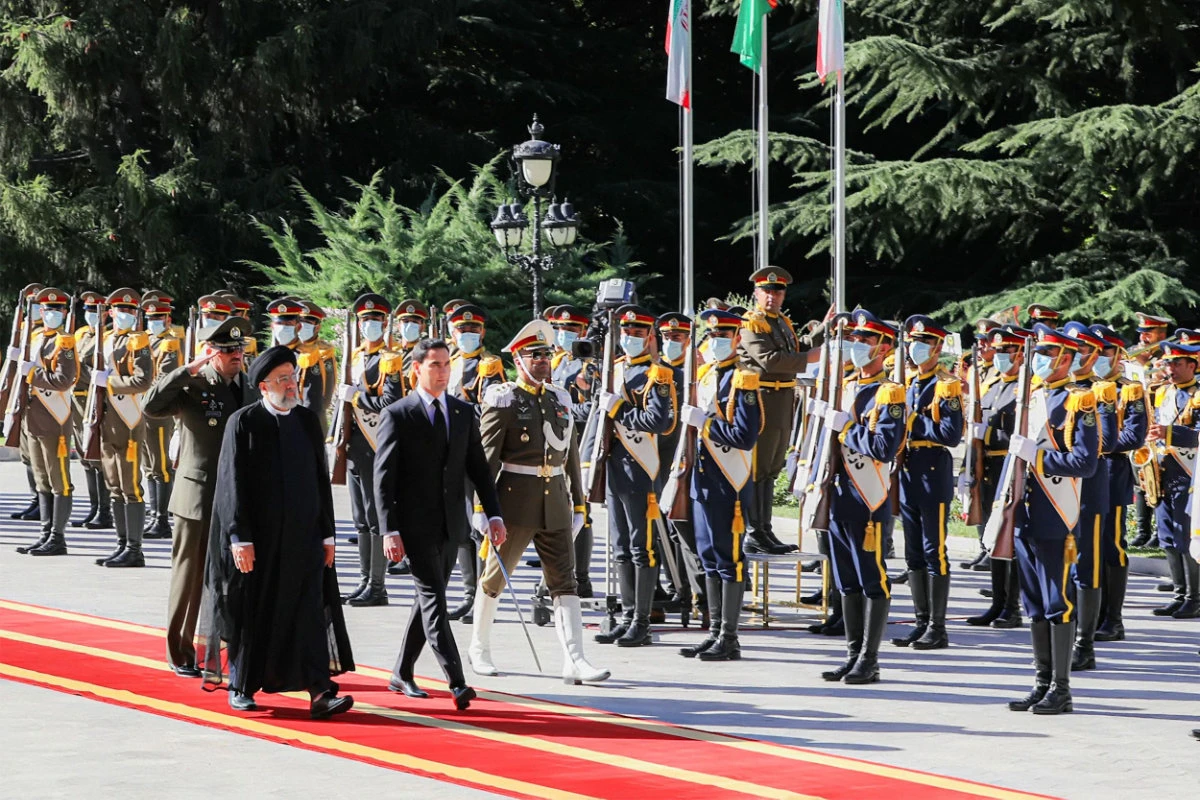 Iran's President Raisi (L) receives Turkmenistan's President Serdar Berdimuhamedow in Tehran on June 15, 2022. (AFP)