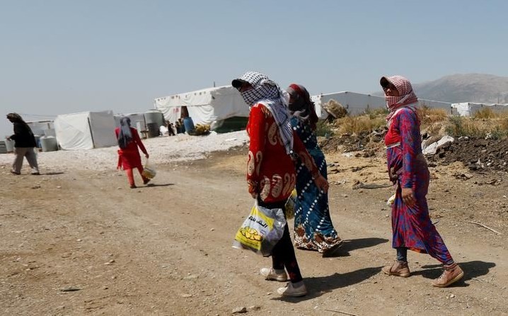 Syrian refugee women at a camp near the town of Qab Elias in Lebanon’s Bekaa Valley, Aug. 8, 2017. (Reuters)