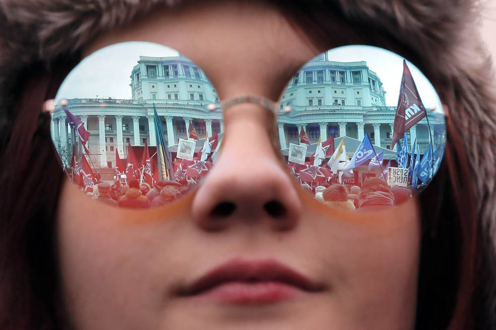 Woman attends an opposition rally in Moscow, Russia 17 March 2019.
