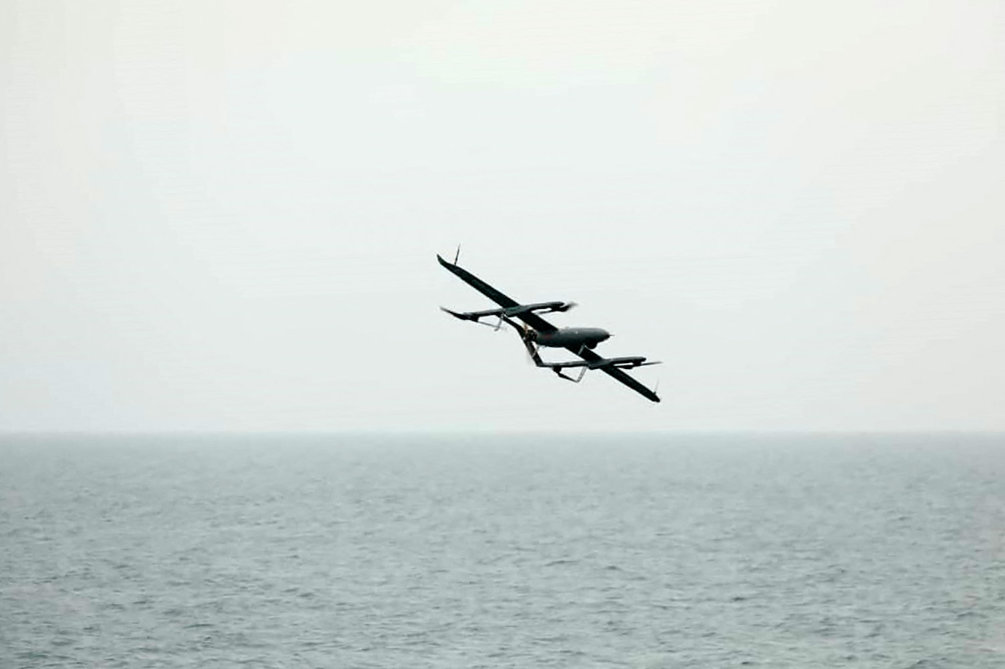 A military unmanned aerial vehicle (UAV or drone) launched from an Iranian navy vessel in the Indian ocean, July 15 2022. (AFP)