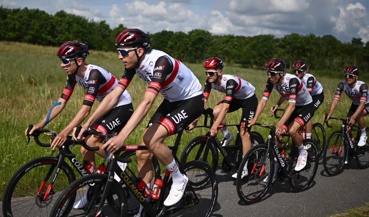 Slovenian cyclist Pogacar (L) and riders of the UAE Team Emirates during a training session on Wednesday, ahead of the start of the 2022 edition of the Tour de France cycling race, in Copenhagen, on Friday. (AFP)