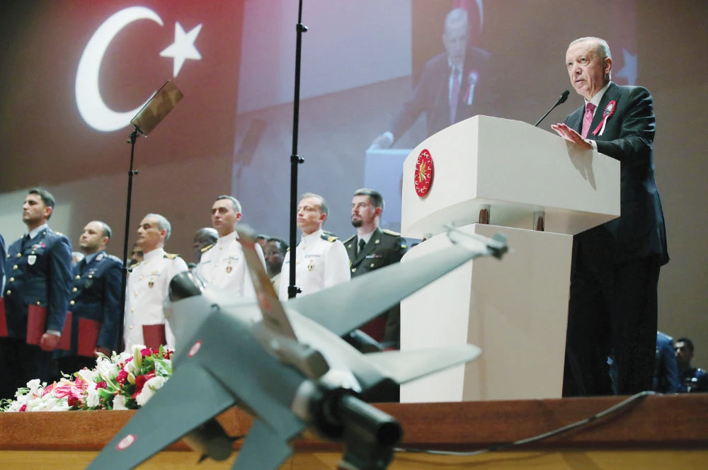 Turkish President Recep Tayyip Erdogan speaks during a graduation ceremony at National Defense University in Istanbul on Friday. (Reuters)