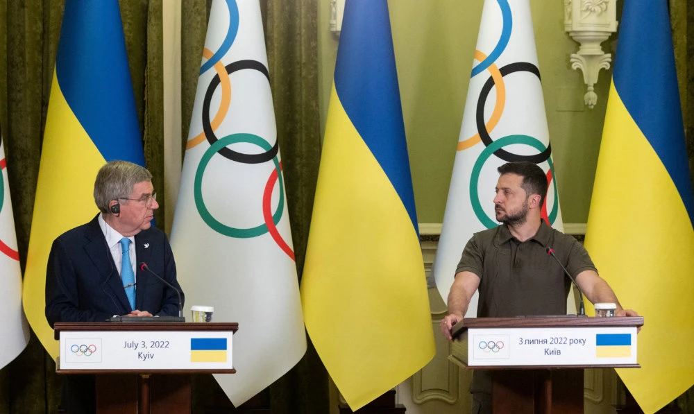 Ukrainian President Volodymyr Zelenskiy and International Olympic Committee President Thomas Bach attend a joint news briefing, as Russia's attack on Ukraine continues, during a parliament session in Kyiv, on July 3, 2022. (Reuters)