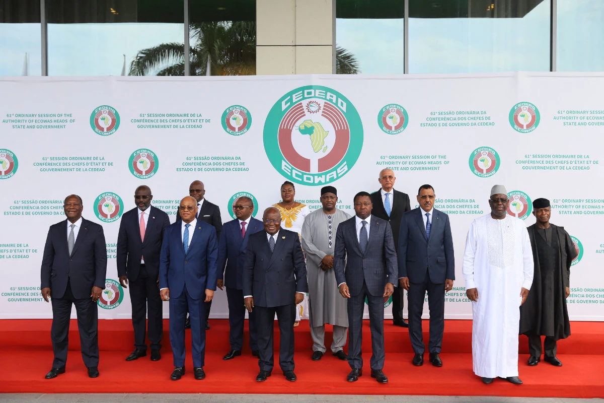 Economic Community of West African States (ECOWAS) heads of state and government pose for a group photo at the ECOWAS 61st Ordinary Session in Accra, Ghana, on July 3, 2022. (AFP)