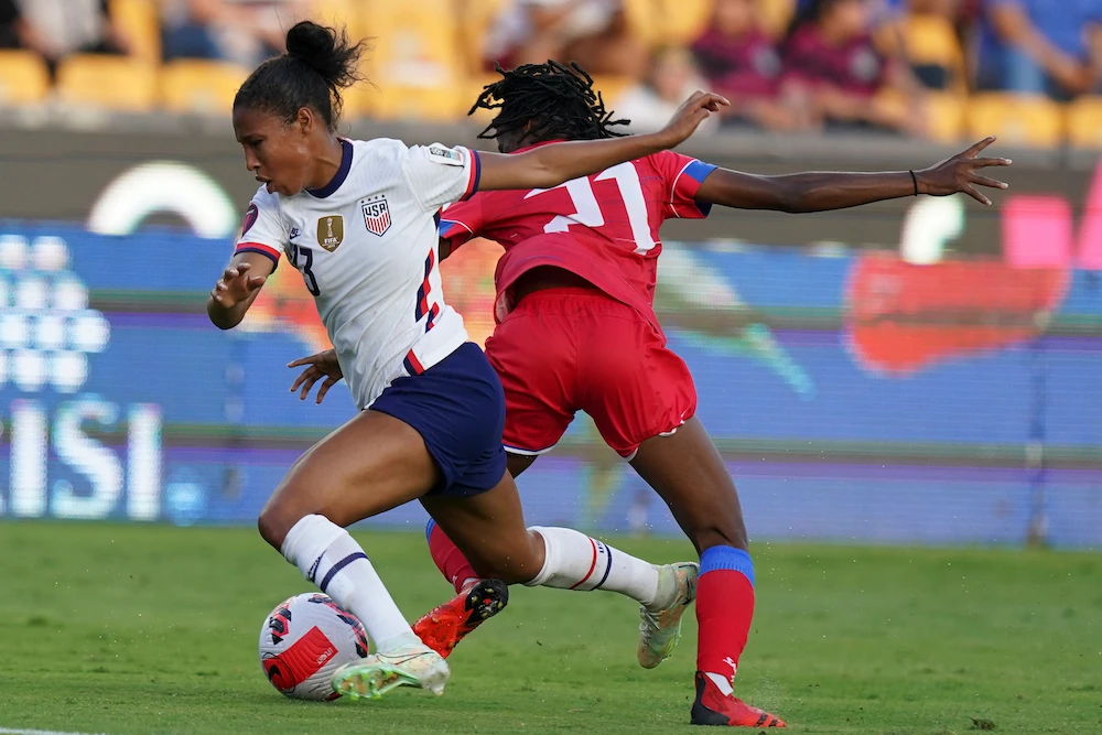 Margaret Purce, left, of the US and Haiti’s Ruthny Mathurin during their CONCACAF Women’s Championship football match in Monterrey, Mexico, Monday. (AP)