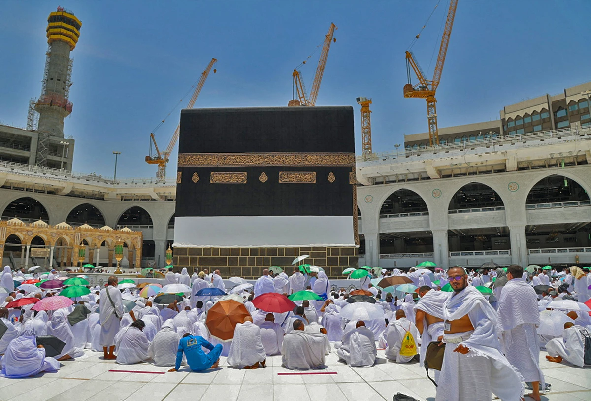Muslim worshippers gather before the Kaaba at the Grand Mosque in Saudi Arabia's holy city of Makkah on July 1, 2022. (AFP)