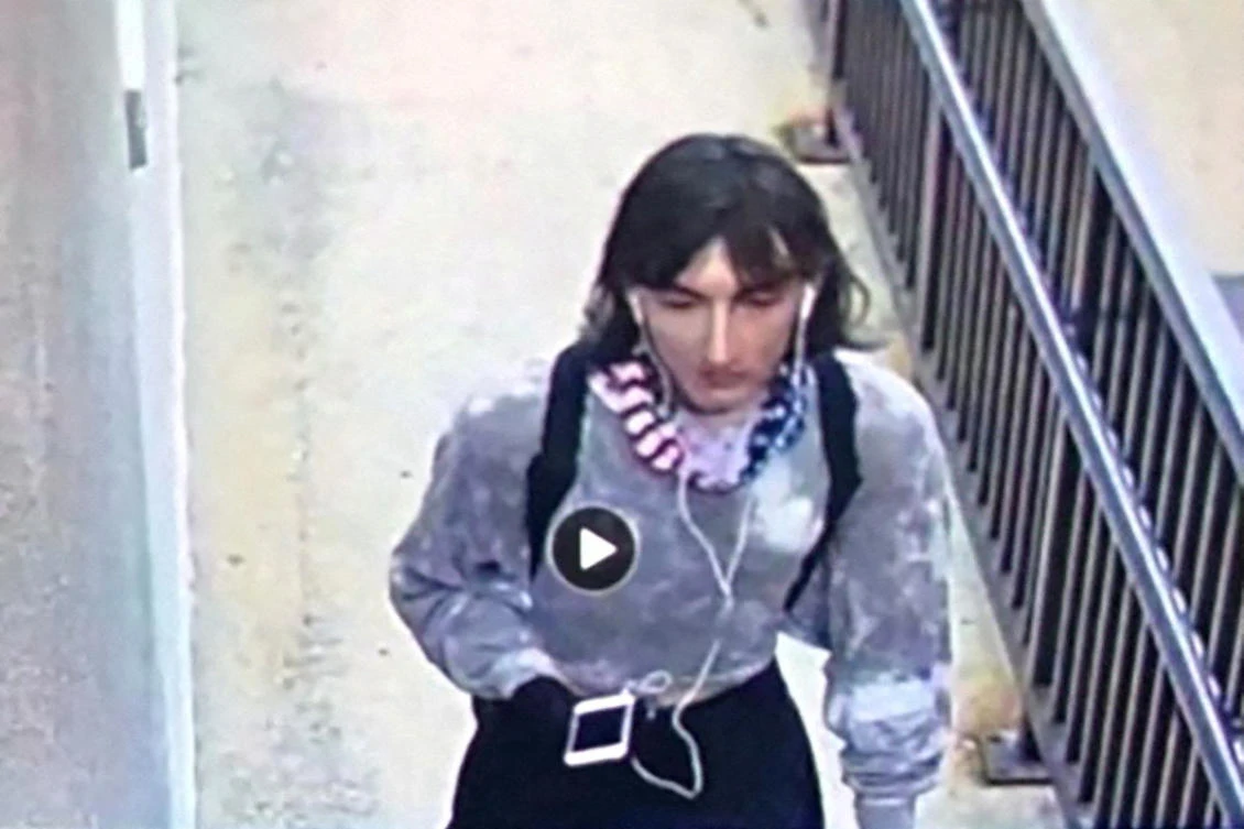 A still image from surveillance footage shows Robert Crimo dressed in women’s clothing on July 4, 2022. (Highland Park Police Department via Reuters)