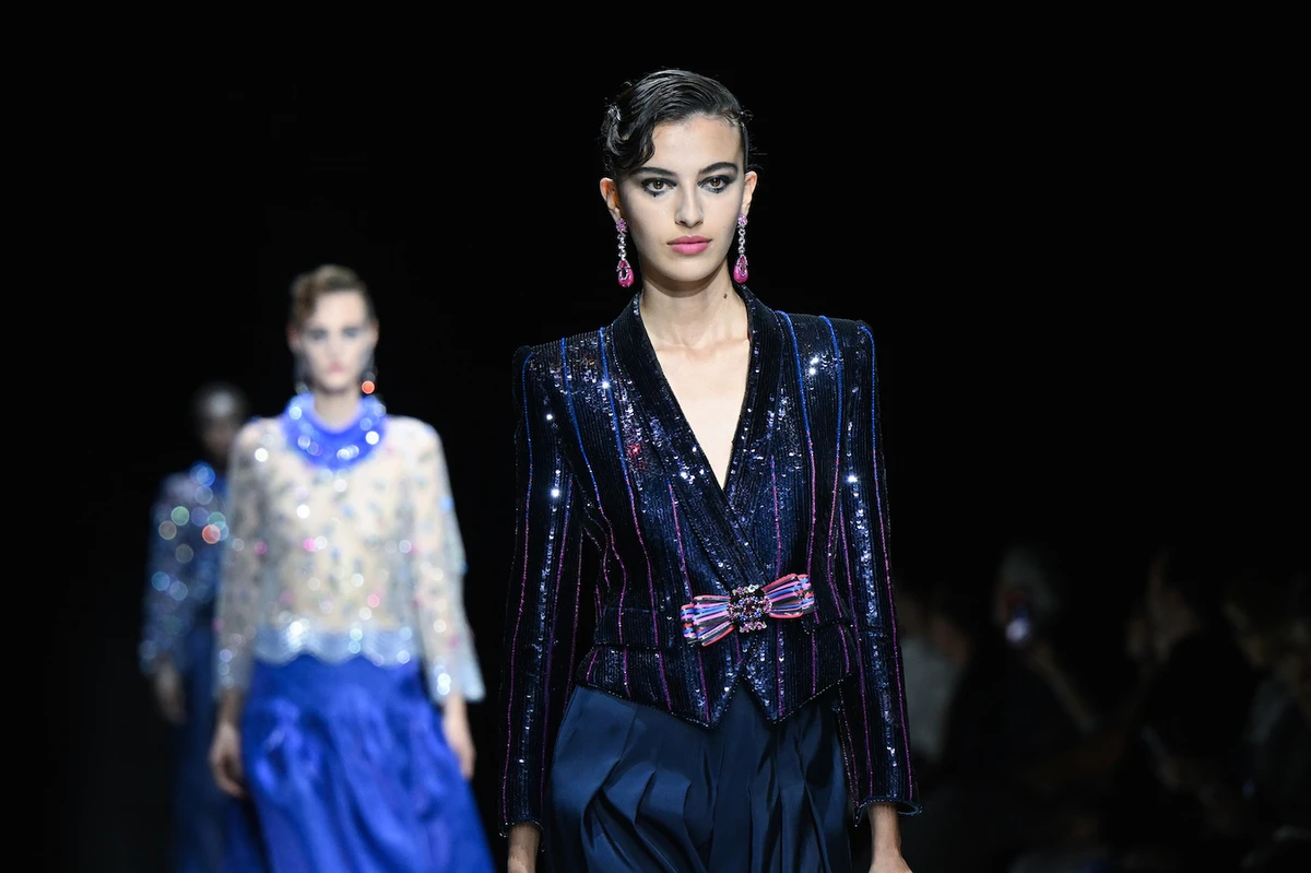 During the Armani runway presentation, Al-Zuhair stepped out in a purple-blue set. (Getty Images)