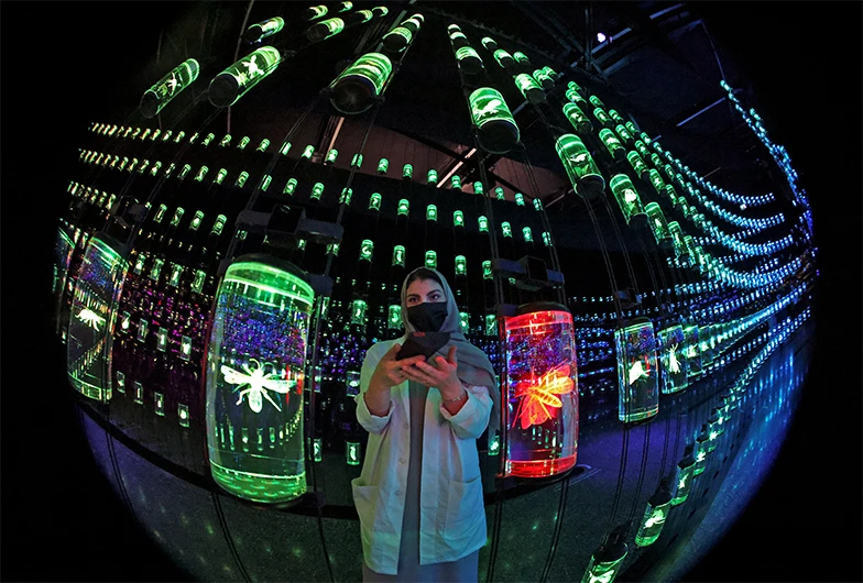 An Emirati woman is pictured inside the 'Museum of The Future' on 23 February 2022, one day after its opening in the Gulf emirate of Dubai. (AFP/FILE)
