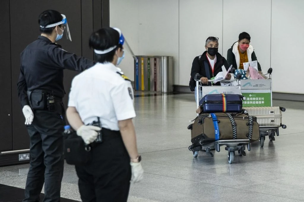 All arrivals in Hong Kong are still required to quarantine for at least one week in a hotel. (AFP)