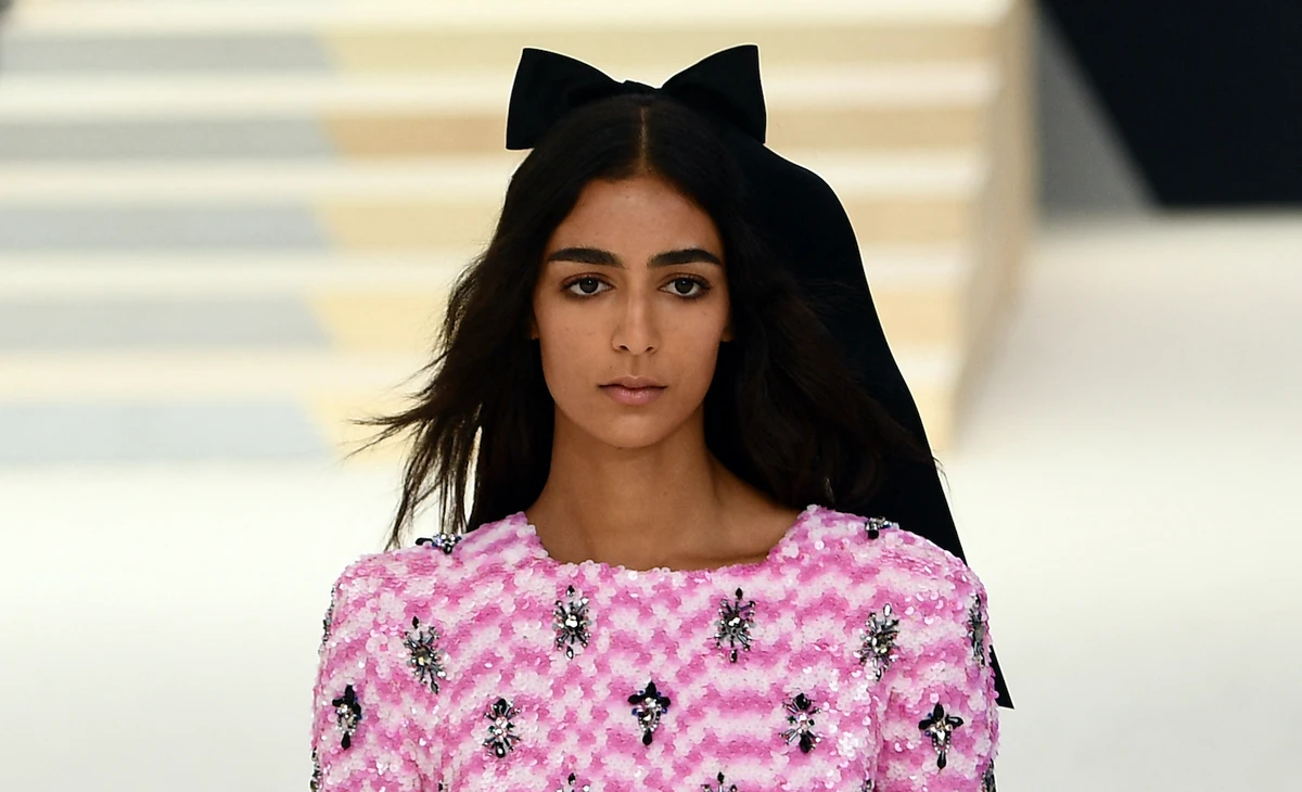 Nora Attal wore a pink and white embellished pencil dress on the runway. (AFP)