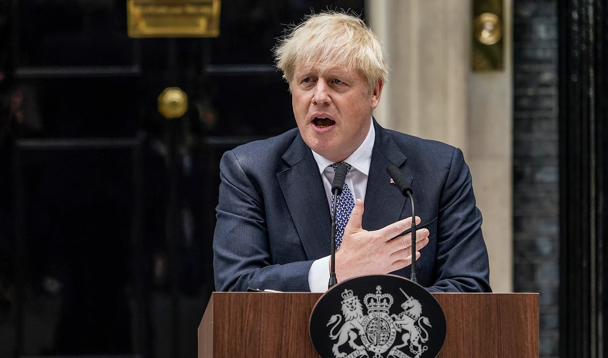 British Prime Minister Boris Johnson speaks to media next to 10 Downing Street in London, on July 7, 2022. (AP)