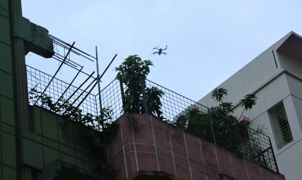 A drone of the Dhaka North city corporation is seen monitoring a residential area of the Bangladeshi capital in July 2022. (Supplied)