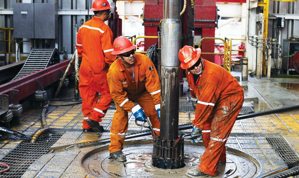 Brent crude futures were up $4.68, or 4.7 percent. WTI crude futures climbed 5.2 percent, to $103.64 a barrel. The US tightened sanctions on Iran. (AP/File)