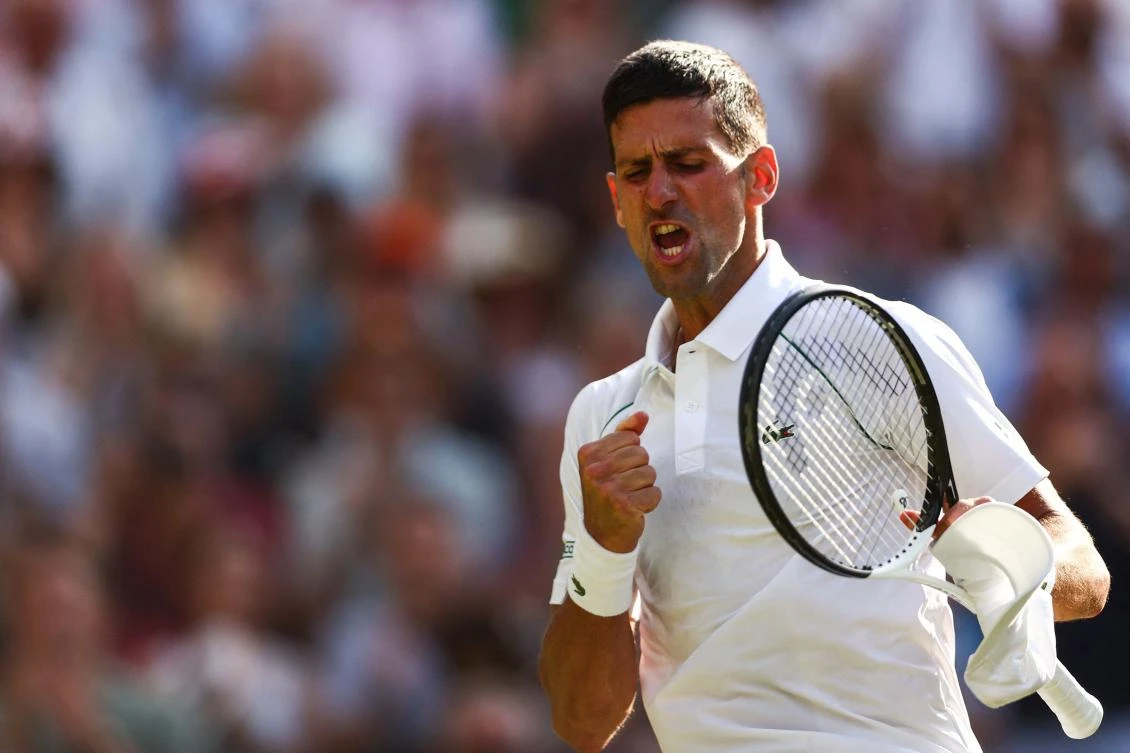 Serbia’s Novak Djokovic celebrates beating Britain’s Cameron Norrie during their men’s singles semifinal tennis match on the twelfth day of the 2022 Wimbledon at The All England Tennis Club in Wimbledon on Friday. (AFP)