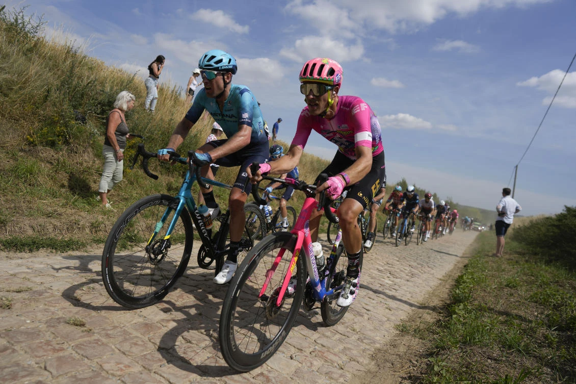 Riders pass over cobblestones during the fifth stage of the Tour de France cycling race over 157 kilometers with start in Lille Metropole and finish in Arenberg Porte du Hainaut, France. (File/AFP)