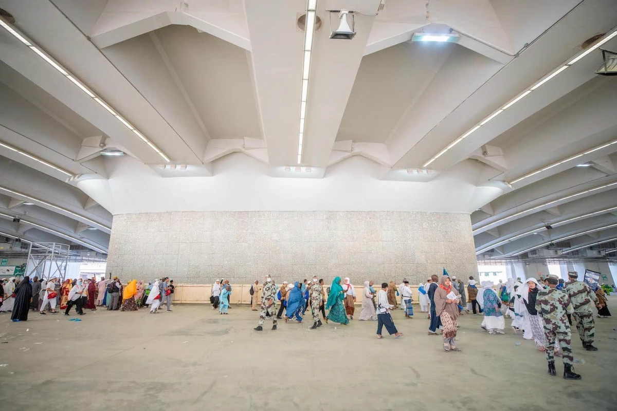Hajj pilgrims take part in ‘stoning the devil’ ritual at Jamarat complex on first Tashreeq day