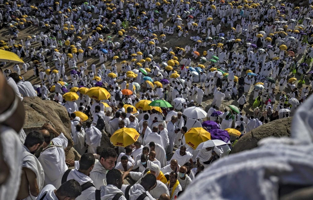 With beautiful memories and strengthened faith, pilgrims expressed their happiness after completing the fifth pillar of Islam with tears and gratitude. (AFP)