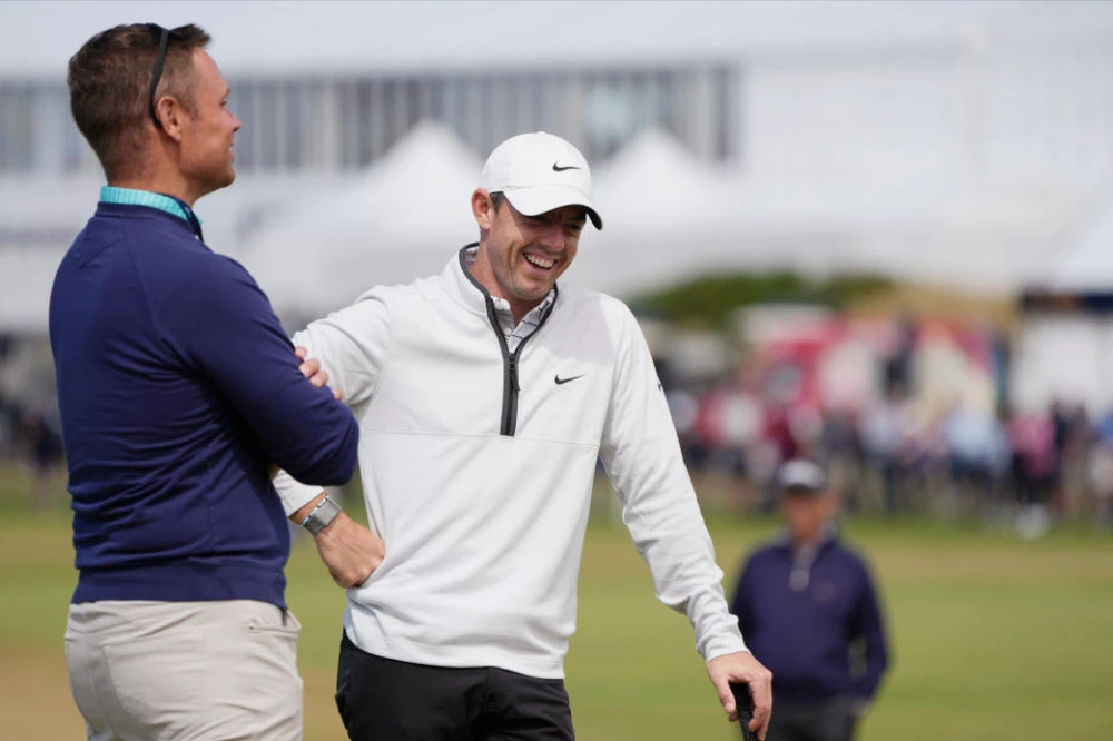 Northern Ireland's Rory McIlroy, right, during a practice round at the British Open golf championship on the Old Course at St. Andrews, Scotland, Tuesday. (AP)