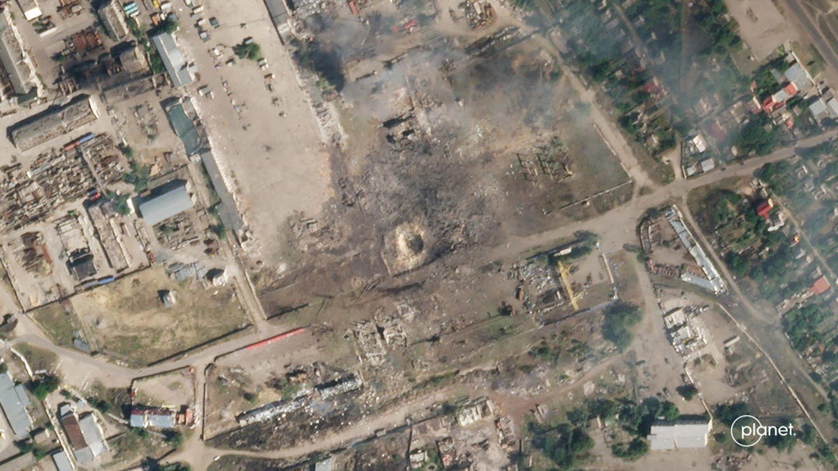 Above, aftermath of artillery fire in Nova Kakhovka, south of Ukraine, which destroyed a Russian ammunition store. (Planet Labs PBC via AFP)