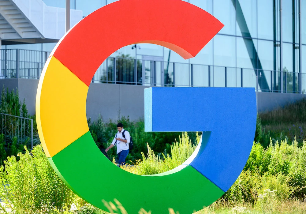 Google and Facebook slow hiring, start layoffs as economic pressure mounts