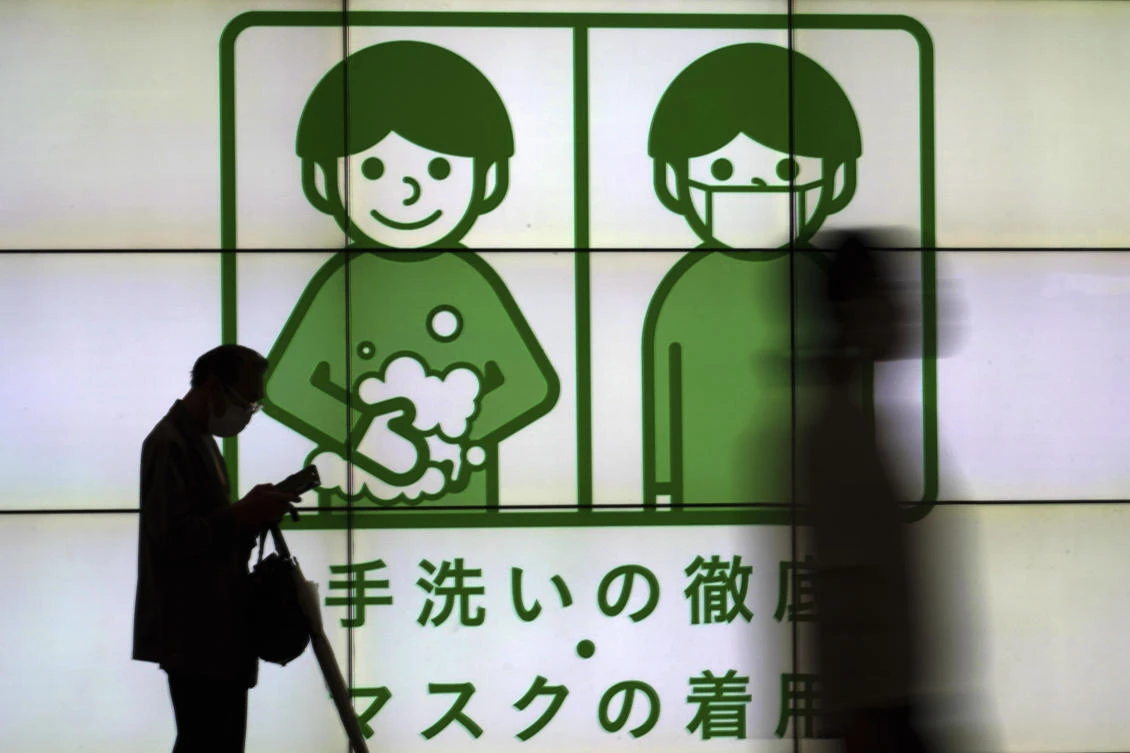 In Japan, new COVID-19 cases have surged to levels not seen since early this year. (AP)