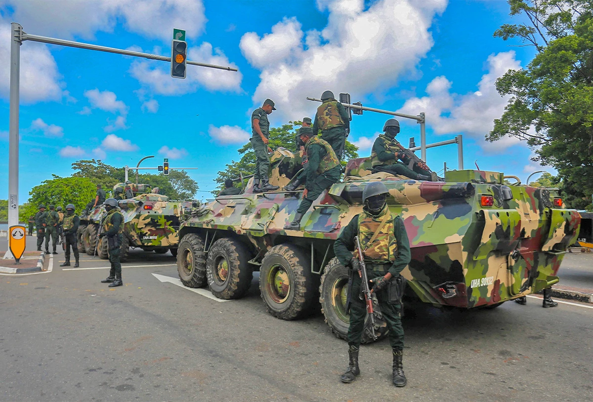 Troops patrol streets as calm returns to Sri Lanka, president's resignation awaited