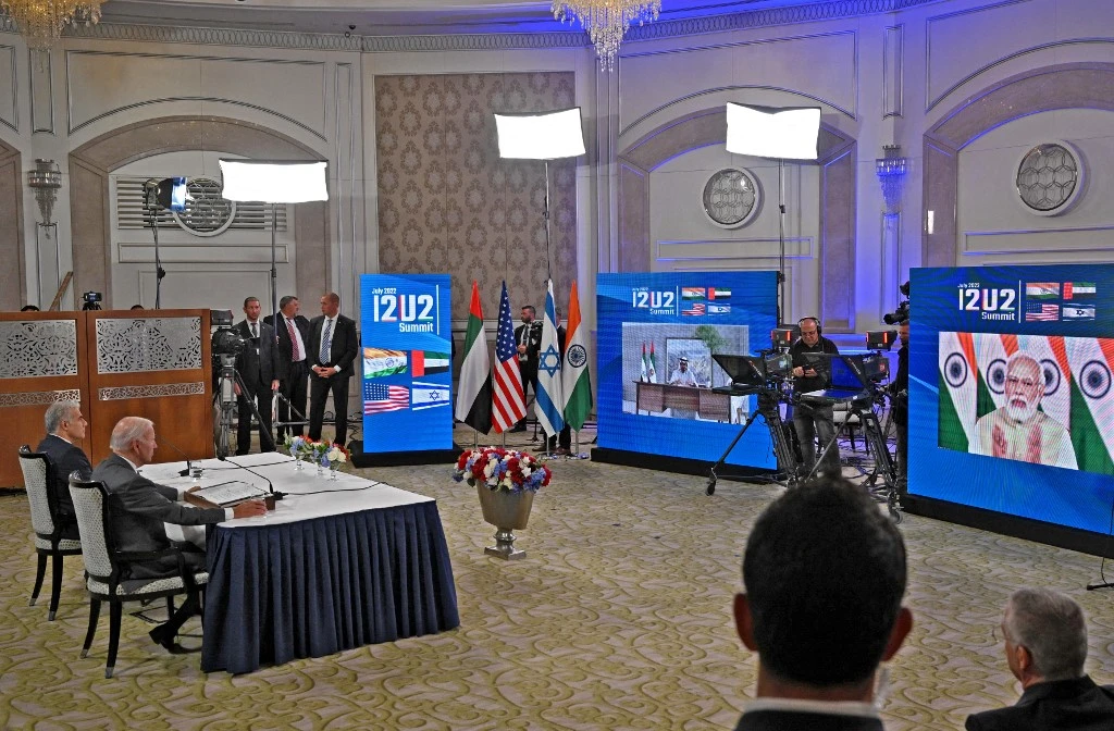 US President Joe Biden, right, and Israel’s caretaker Prime Minister Yair Lapid take part in a virtual meeting with leaders from the UAE and India on July 14, 2022. (AFP)