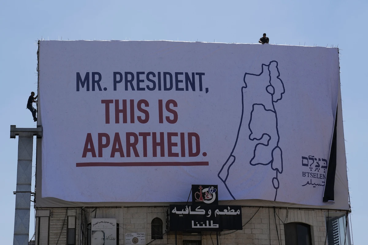 Israeli rights group protests ‘apartheid’ during Biden trip