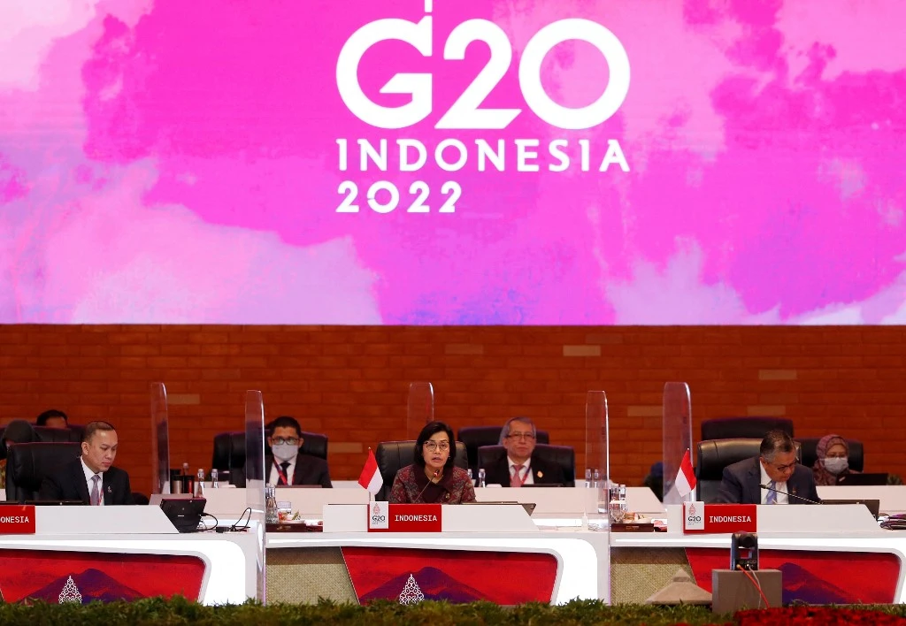 Indonesia's Finance Minister Sri Mulyani Indrawati (C) delivers a speech during the opening of the G20 Finance Ministers and Central Bank Governors Meeting in Nusa Dua, on Indonesia resort island of Bali, on July 15, 2022. (Shutterstock)