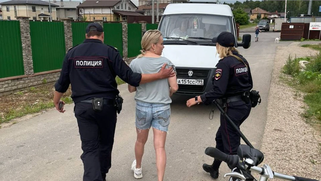 Russian police detain journalist who staged TV protest over Ukraine